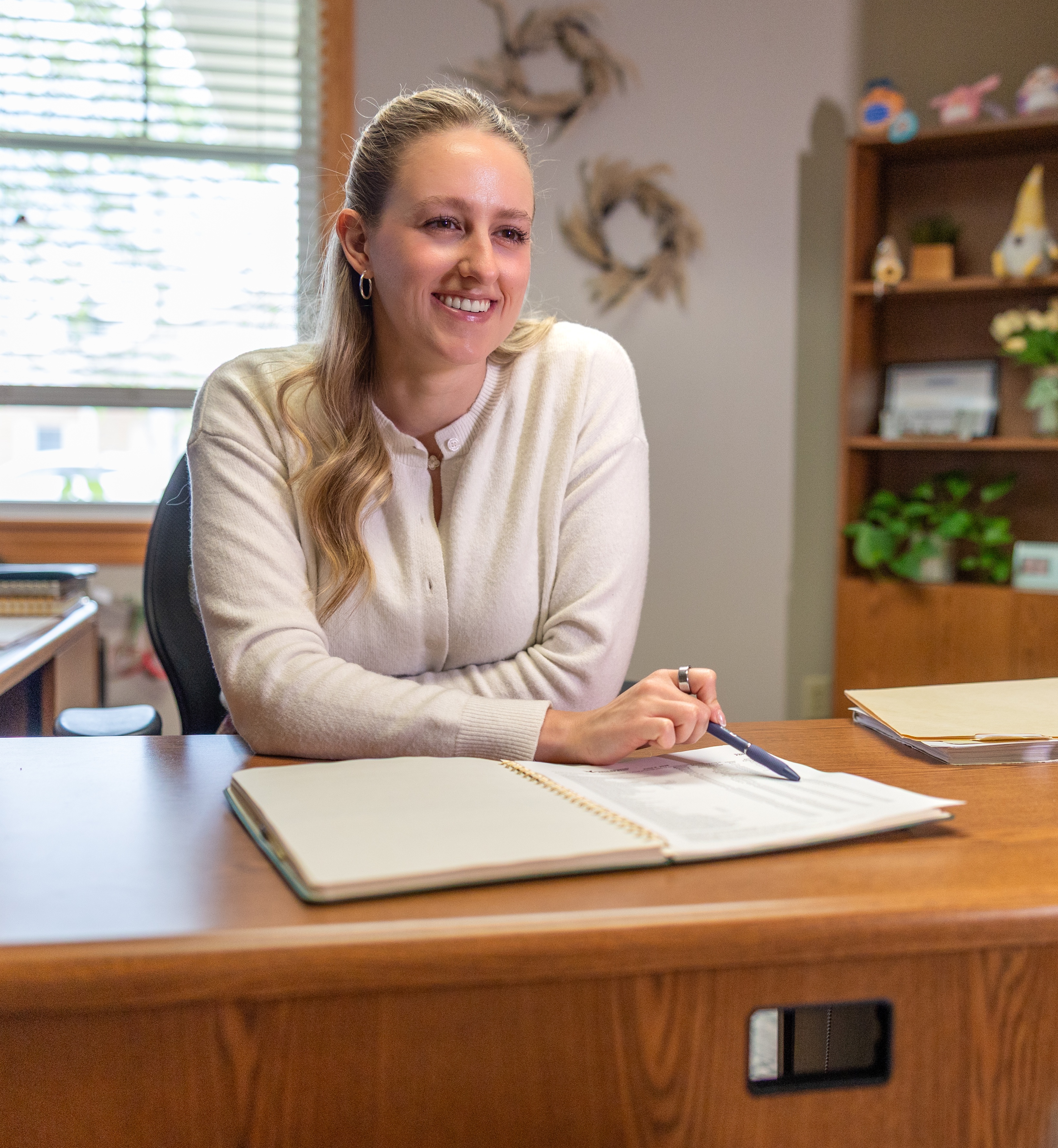Natalie Darabon assists customer
