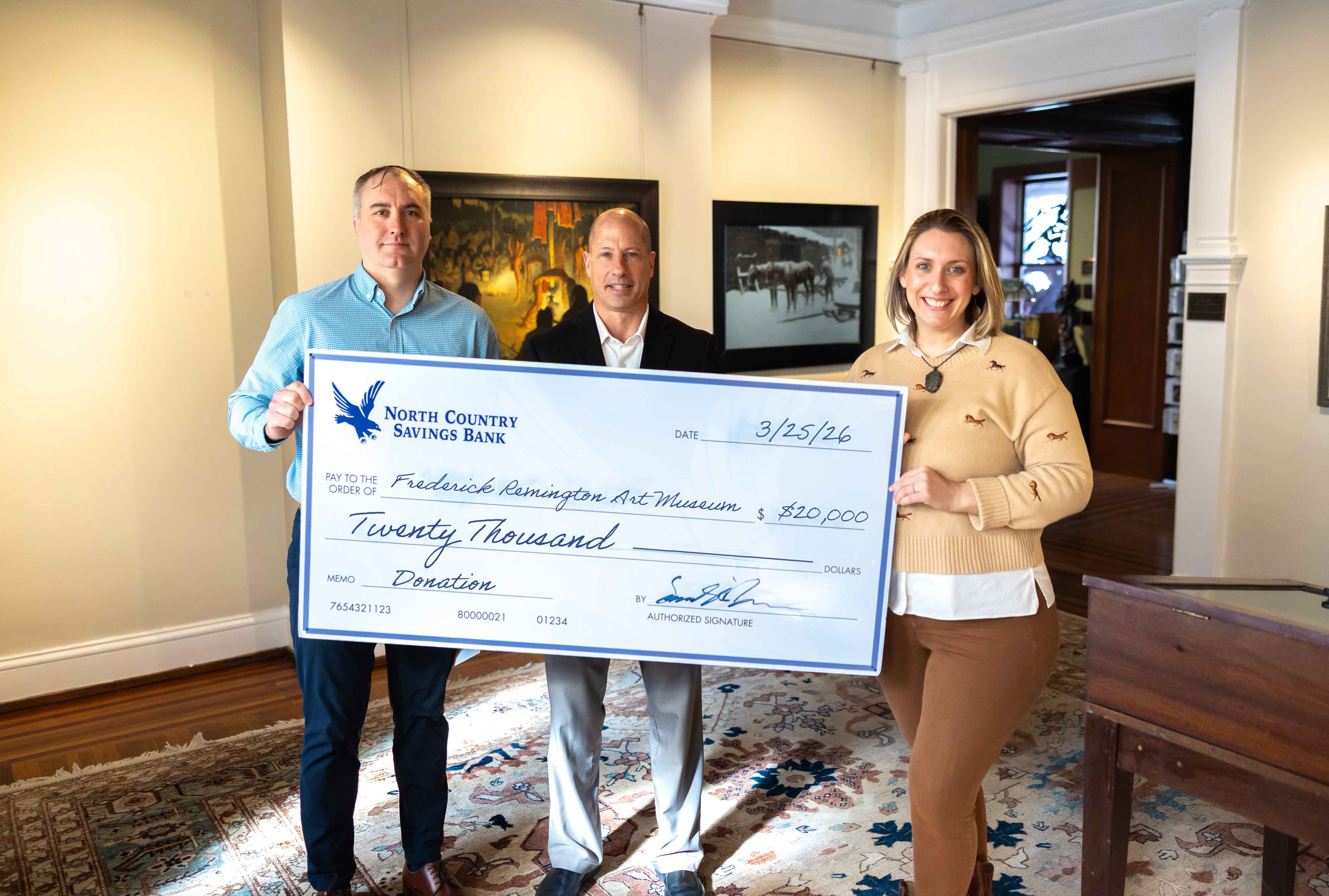 Donation Photo, NCSB delivering donation check to the Frederic Remington Art Museum
