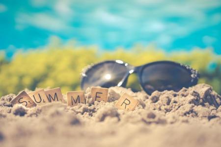 Sunglasses on beach in summer