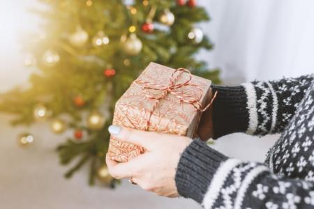 Woman holding holiday gift